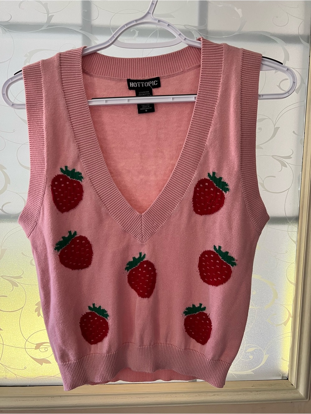 Hot Topic size small pink deep v neck seater vest with strawberries.
